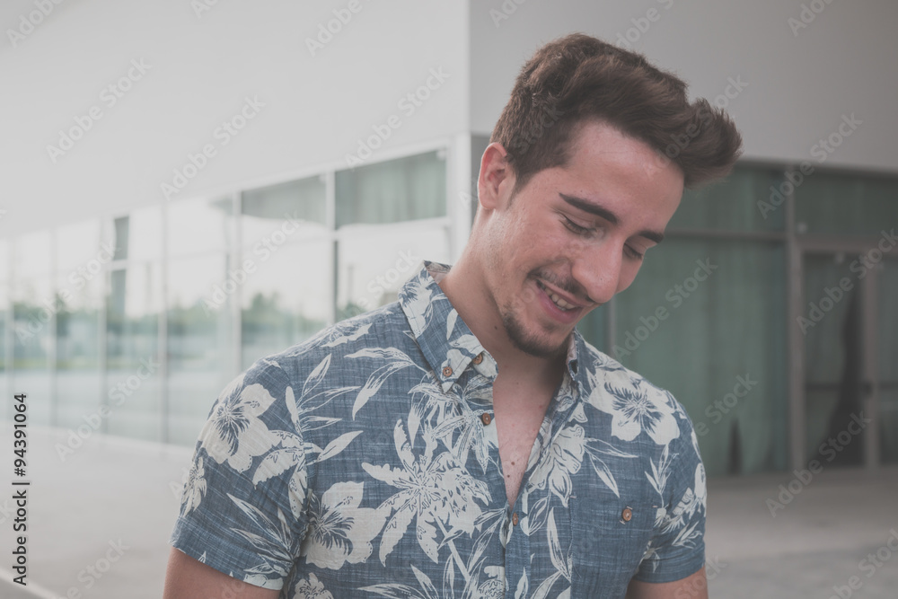 Young handsome man posing in the street Young handsome man posing in the street