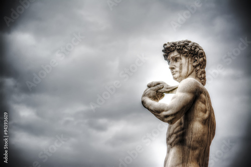 Michelangelo's David under an overcast sky