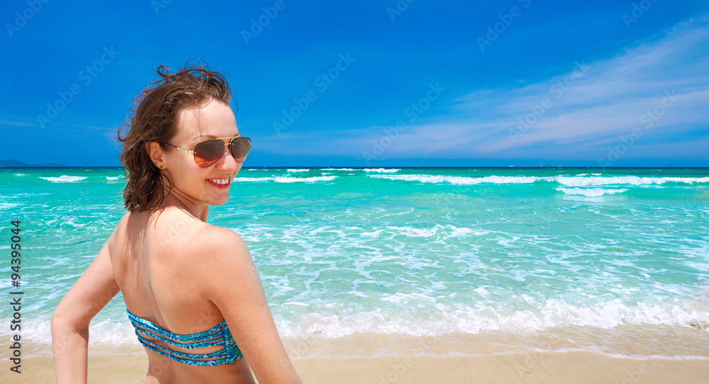 Happy girl on the tropical beach. Panoramic view Happy girl on the tropical beach. Panoramic view