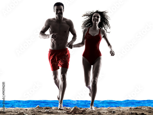 couple walking running on the beach  © snaptitude