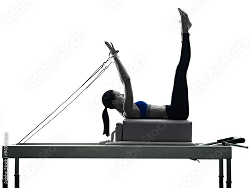 woman pilates reformer exercises fitness isolated photo