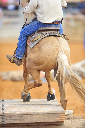 The rider behind on a horseback
