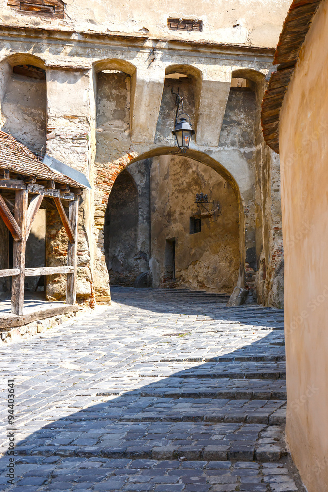 Fototapeta premium Medieval street view in Sighisoara, Romania