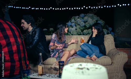 Photography Woman talking with bored female friend in a party