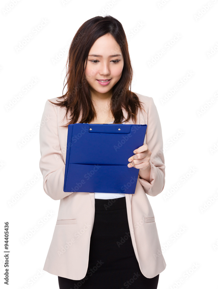 Asian Buisnesswoman take note on clipboard Asian Buisnesswoman take note on clipboard