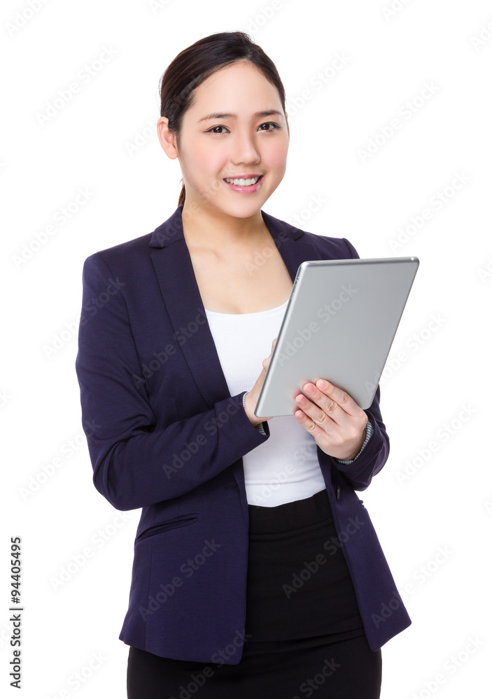 Asian businesswoman use of the digital tablet Asian businesswoman use of the digital tablet