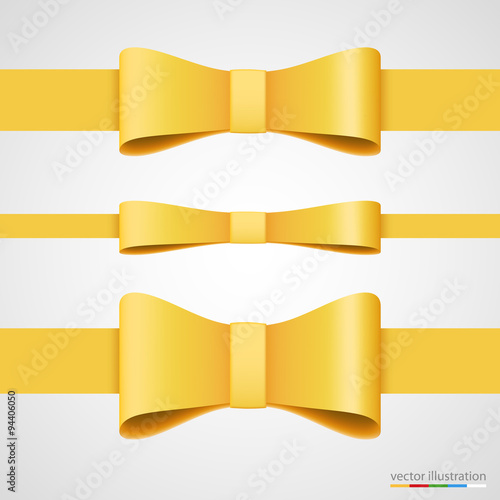 Holiday golden ribbon and bow.