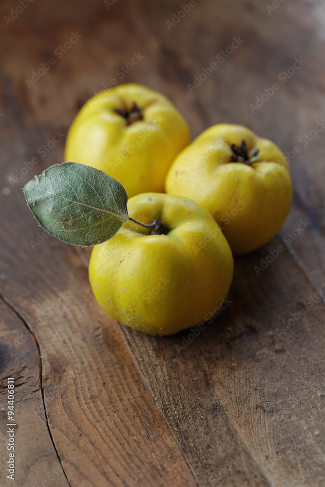 Quince on wooden table

