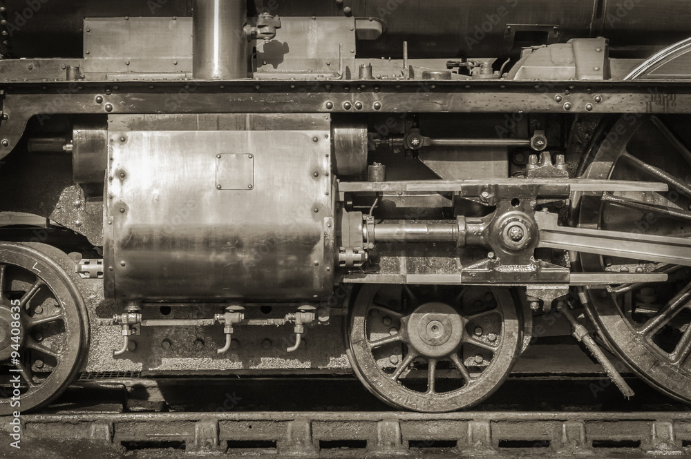 sepia toned vintage steam locomotive wheels