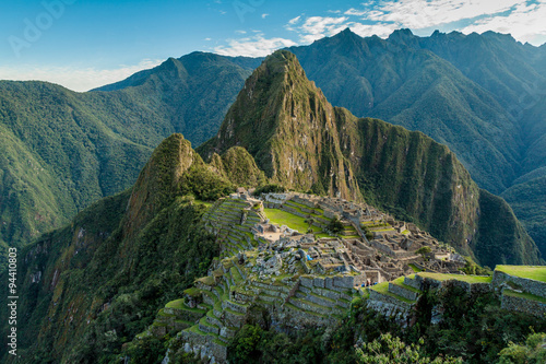 Aerial view of famous Mach Picchu ruins, Wayna Picchu mountain in the bacground. photo