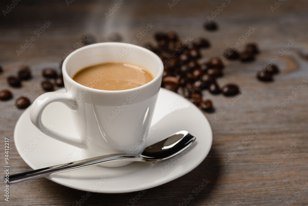 hot espresso coffee on the wooden table