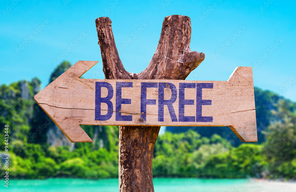 Be Free arrow with beach background