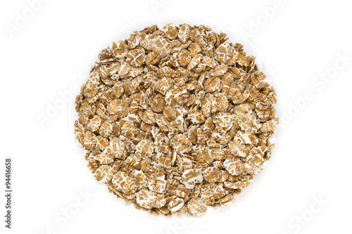 Oatmeal on a vintage wood background
