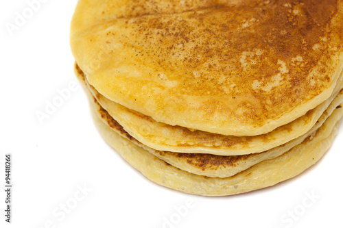 sweet pancakes over white background