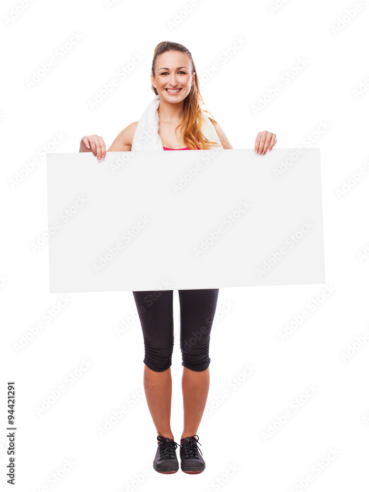 pretty young sporty woman holding a banner over white pretty young sporty woman holding a banner over white
