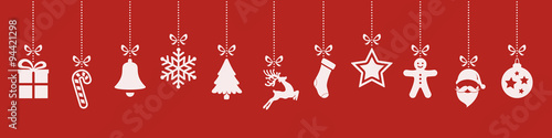 christmas ornaments hanging red background