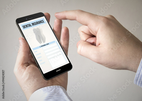  touchscreen smartphone with dental insurance on the screen