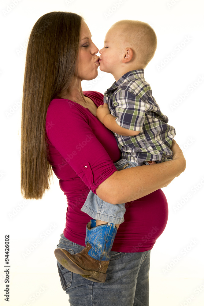 pregnant woman in red shirt side kiss boy Stock Photo | Adobe Stock