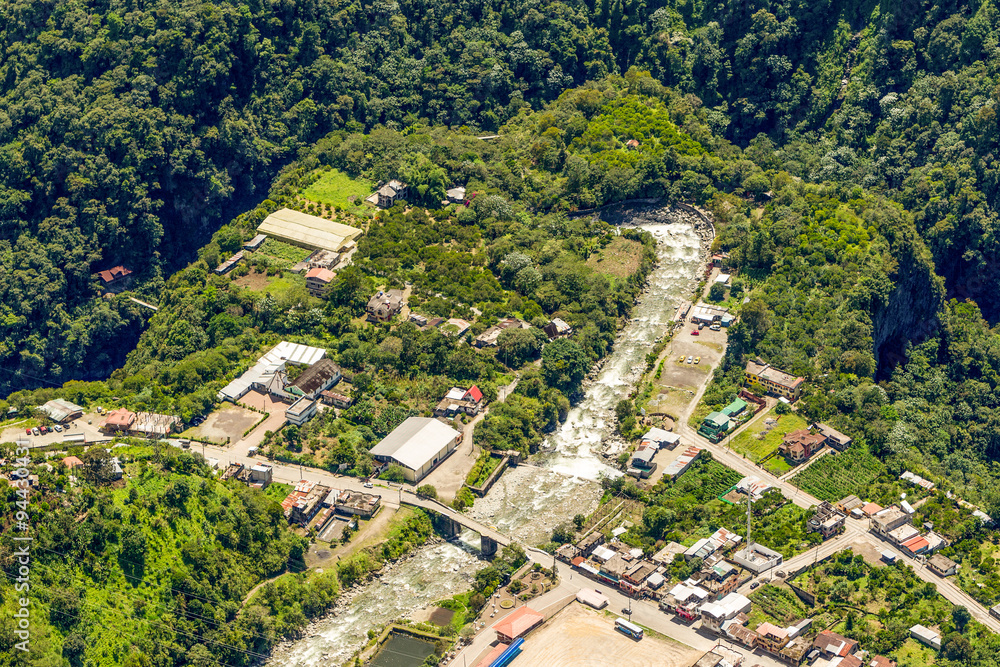 Experience the breathtaking beauty of Rio Verde Village nestled in the stunning Ecuadorian Andes with an awe inspiring aerial shot.