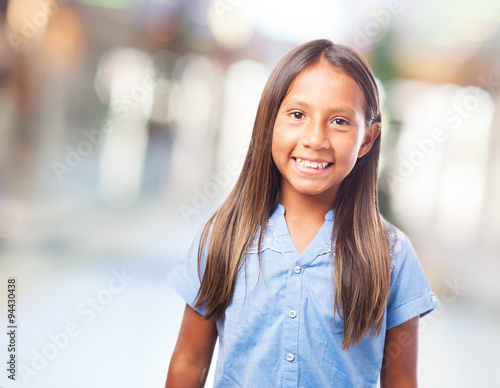 portrait of a cute girl smiling over abstract background