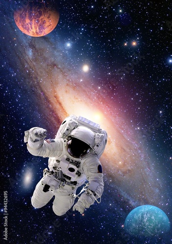 Astronaut spaceman outer space people galaxy planet solar system universe. Elements of this image furnished by NASA.