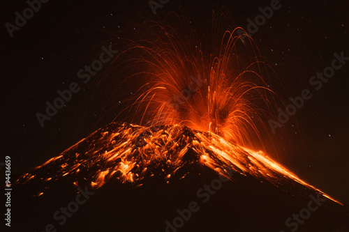 A powerful eruption of the Tungurahua volcano in Ecuador sends a massive plume of smoke, magma, and lava into the sky.