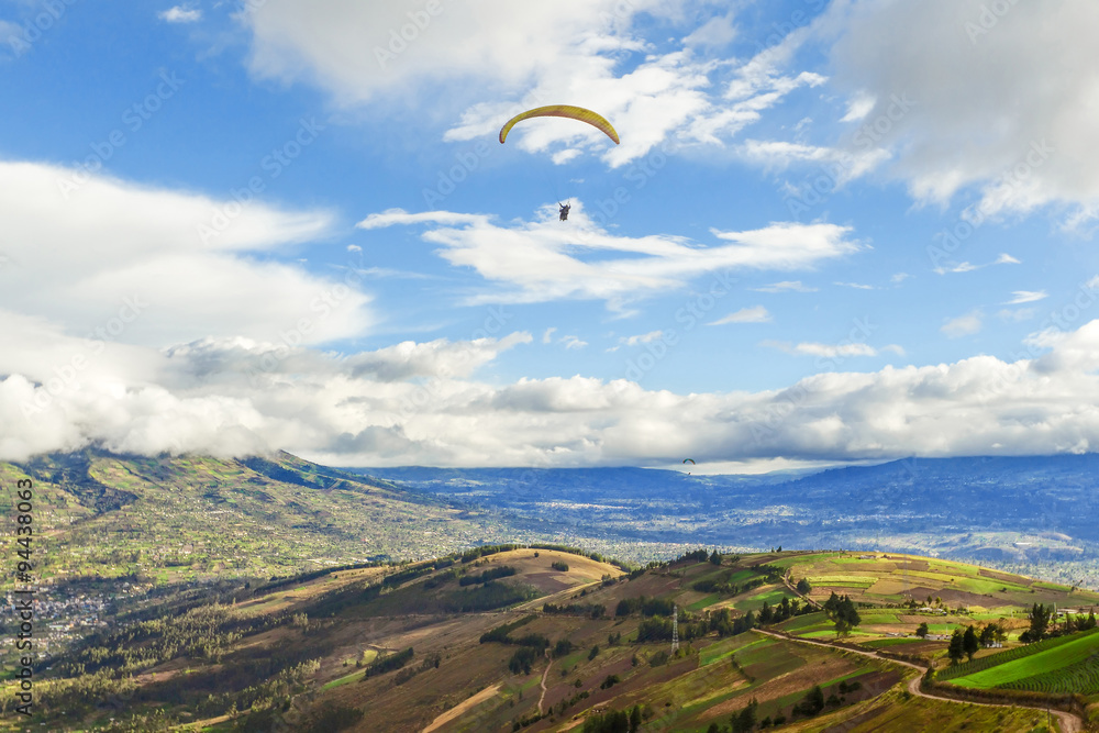 Experience the thrill of paragliding over the breathtaking Ecuadorian Andes,immersing yourself in the stunning beauty of the landscape. Experience the thrill of paragliding over the breathtaking Ecuadorian Andes,immersing yourself in the stunning beauty of the landscape.