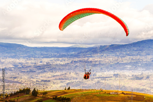 Embark on an awe inspiring paragliding journey over the stunning landscapes of the Ecuadorian Andes where every glide offers a breathtaking vista of the region's natural beauty and rugged terrain