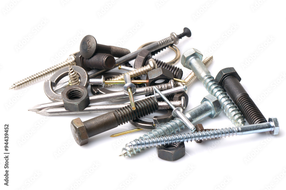 A group of various screws, nails, and rivets with nuts, isolated on a white background, showcasing different objects. A group of various screws, nails, and rivets with nuts, isolated on a white background, showcasing different objects.