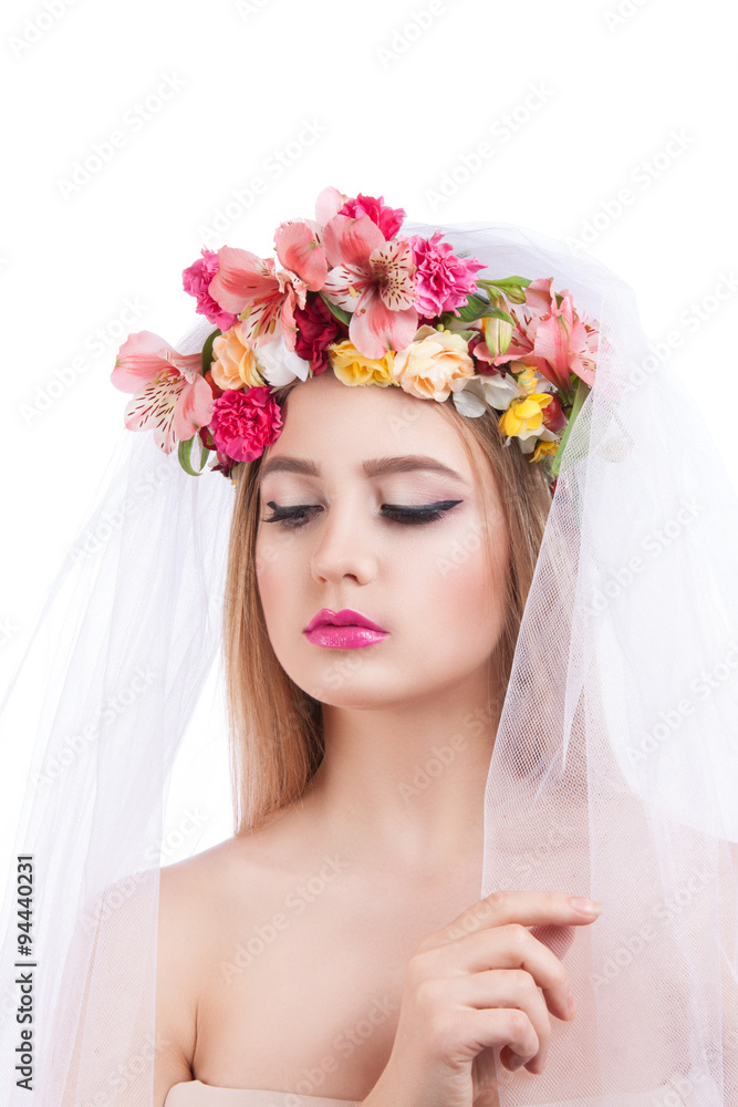 Portrait of a young beautiful girl. bride in veil.
