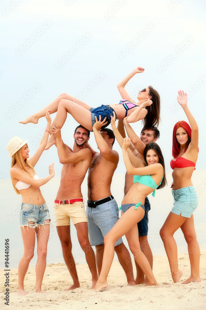 Beautiful young people having fun on beach Beautiful young people having fun on beach
