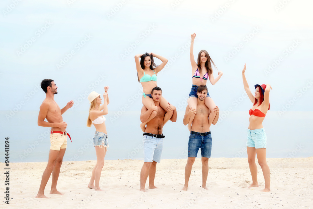 Beautiful young people having fun on beach Beautiful young people having fun on beach