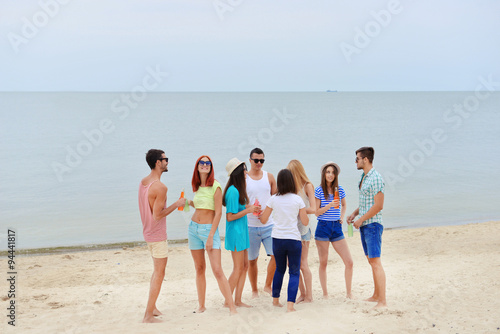 Beautiful young people having fun on beach