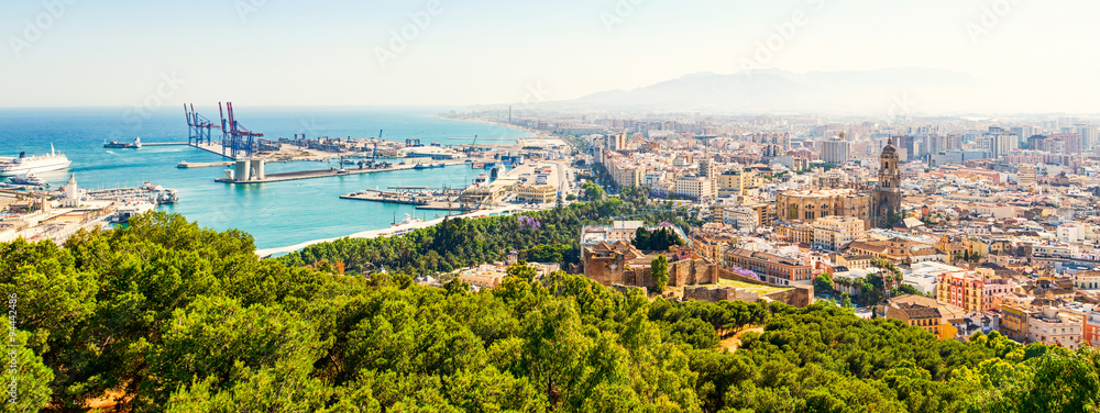 Experience the breathtaking panoramic view of Malaga city,featuring the iconic Alcazaba fortress and the majestic San Juan Bautista Cathedral.