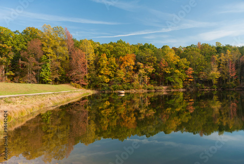 Fototapeta Naklejka Na Ścianę i Meble -  Panoramic view at the lake and forest in a fall