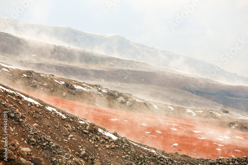 Capture the breathtaking beauty of a cloudy scene over Ecuador's majestic Cotopaxi volcano,a sight that will leave you in awe.