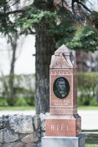 Louis Riel grave under old tree, founder of the province of  Manitoba and leader of the Metis  in St. Boniface Cathedral Cemetery, Winnipeg, Manitoba