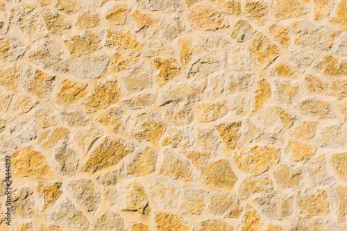 Rustic old stone wall texture background