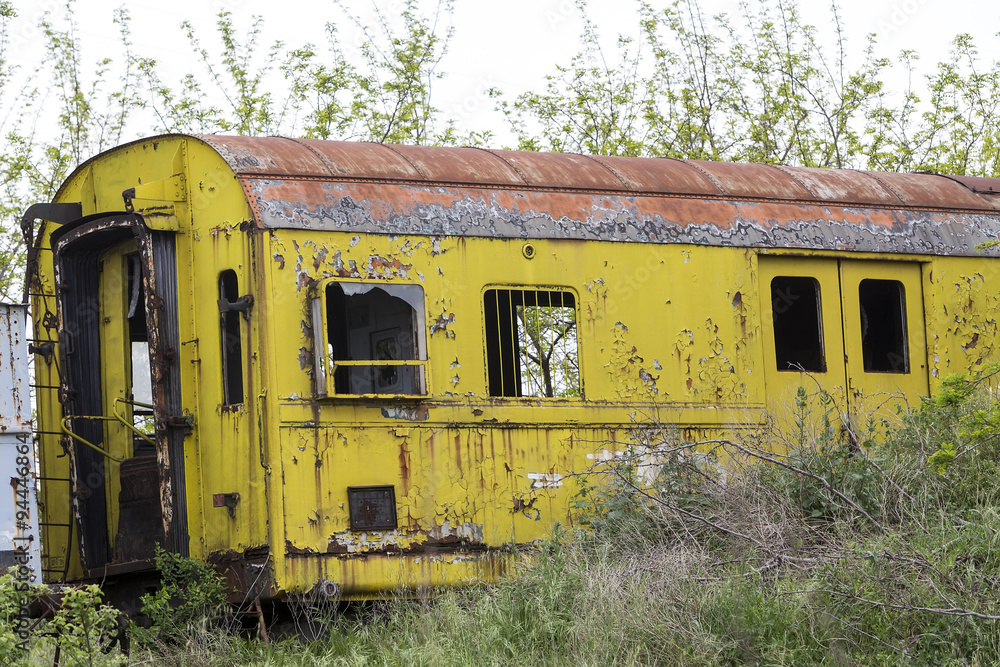 Old and abandoned passenger train wagons in nature Old and abandoned passenger train wagons in nature