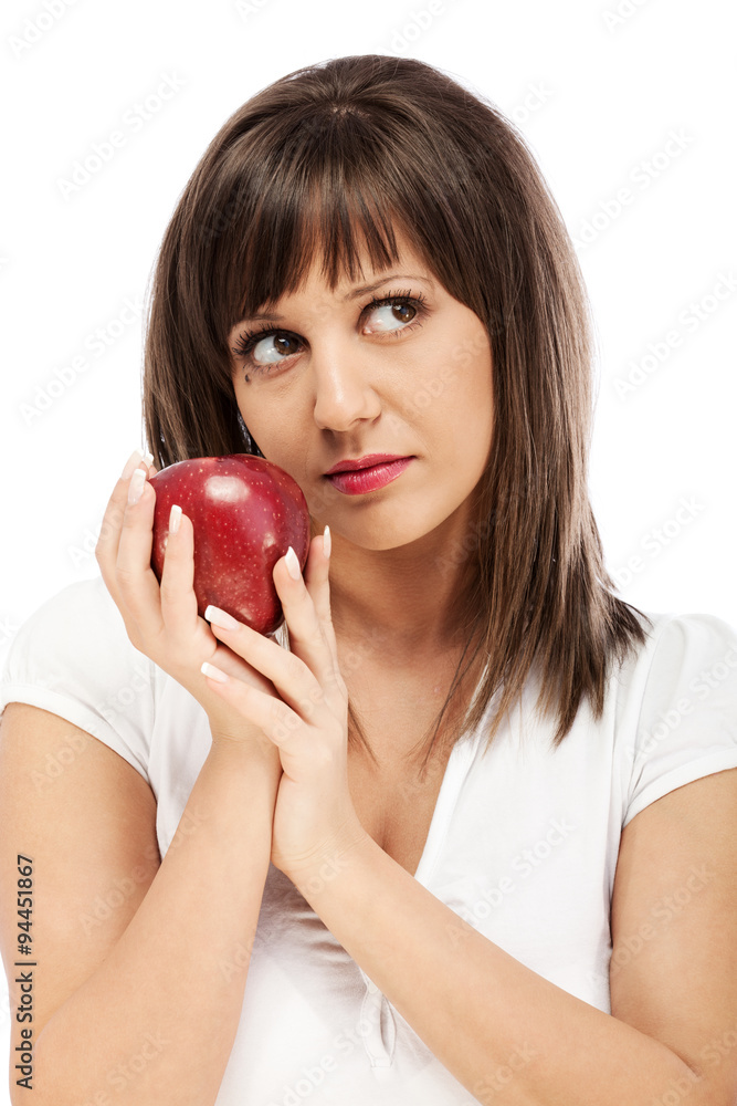 Young woman eating red apple Young woman eating red apple