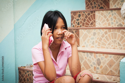 girl sitting alone and cry  at staircase in the park