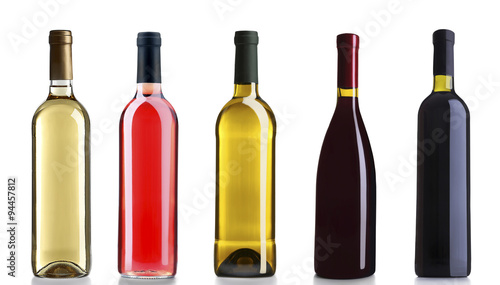 Set of white, rose, and red wine bottles, isolated on white