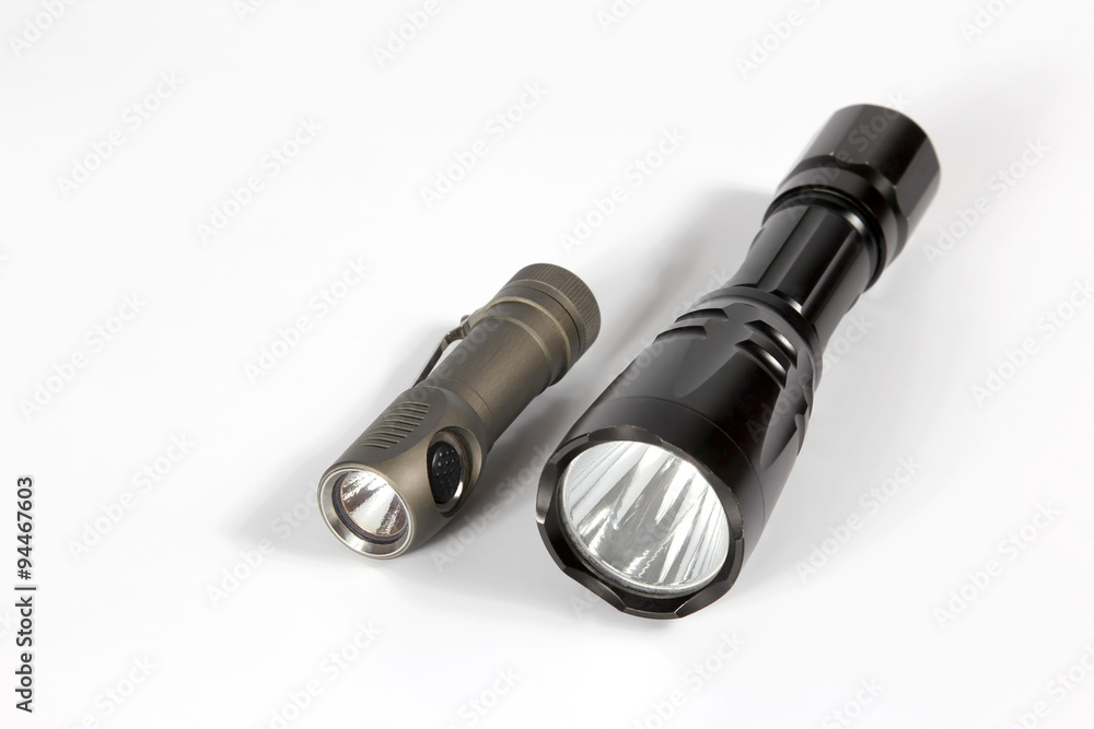 small grey and large black metal lanterns on white background small grey and large black metal lanterns on white background