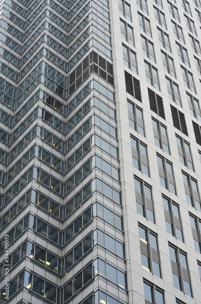 Wall of office building with many windows. Wall of office building with many windows.
