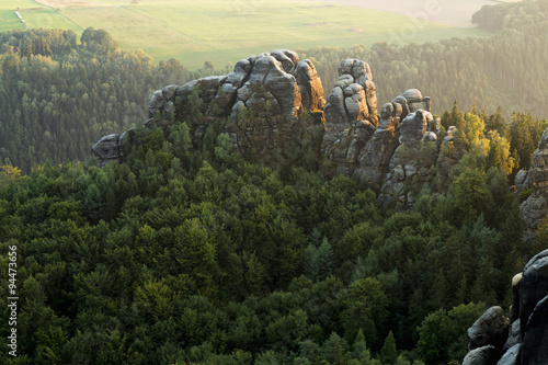 Sandstone rocks, forests and blue sky in the Germany Switzerland