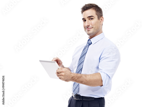 caucasian businessman using tablet computer
