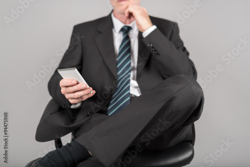 Businessman using his smartphone