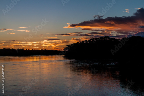 Sunset over river Napo, Peru photo