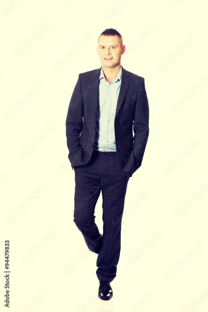 Businessman with hands in pocket Businessman with hands in pocket