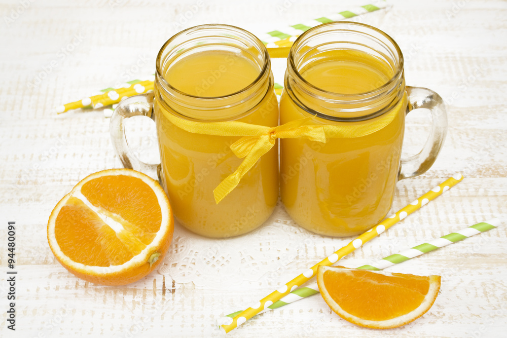 Fototapeta premium orange juice in a jars